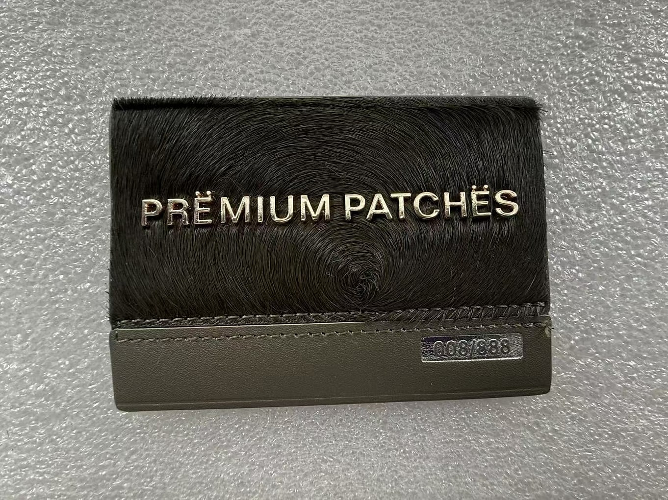 EP TRIM custom leather patch sample — plate 13