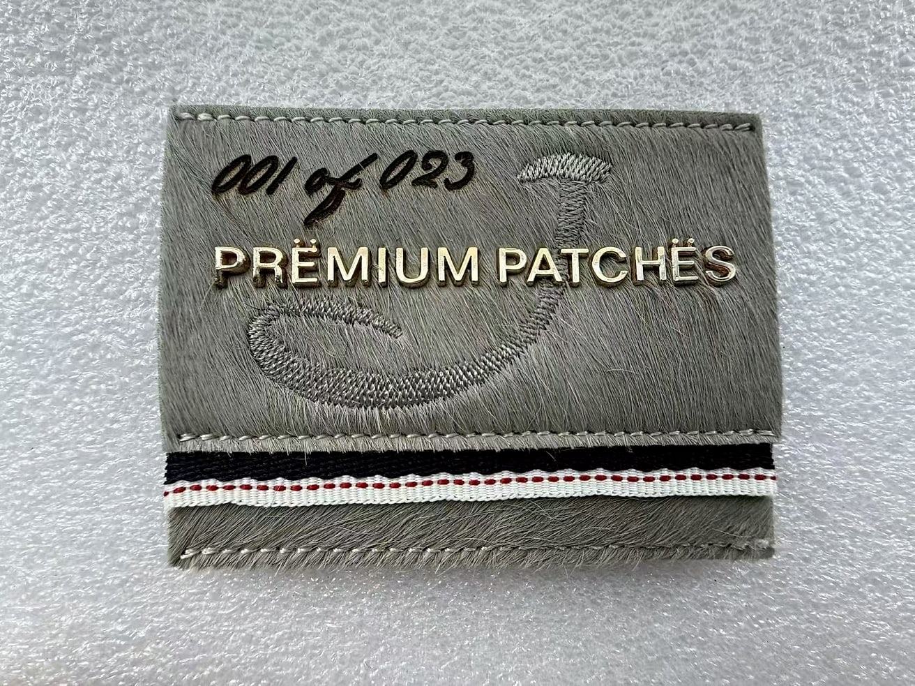 EP TRIM custom leather patch sample — plate 16
