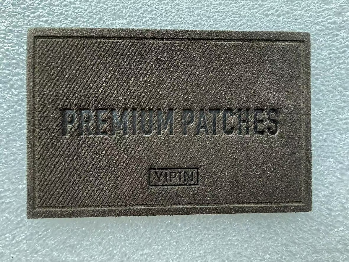 EP TRIM custom leather patch sample — plate 17