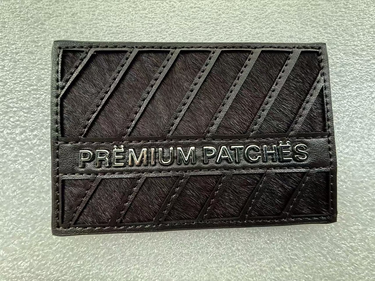 EP TRIM custom leather patch sample — plate 18